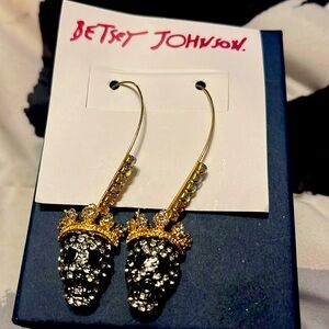 Betsey Johnson earrings new with tags !!  Skulls with bling and they are dangly